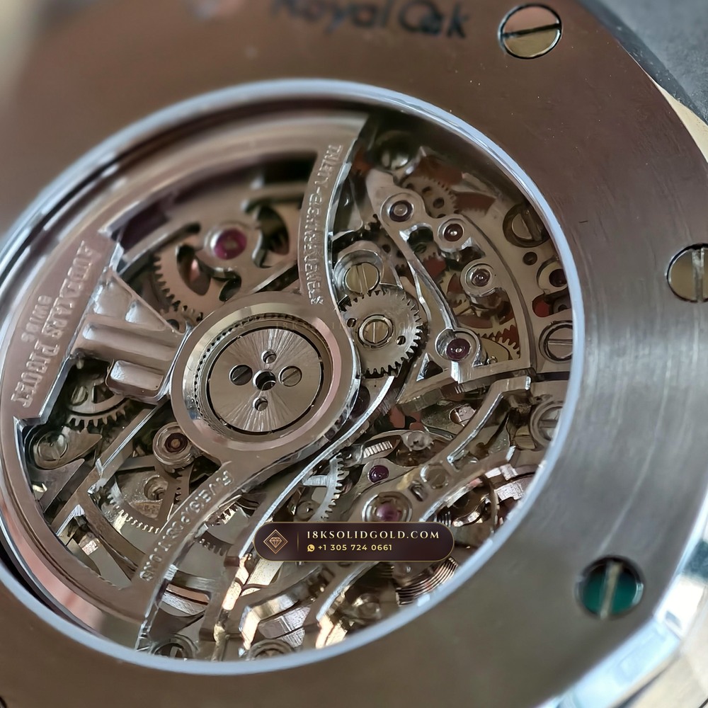 Audemars Piguet Royal Oak Double Balance Wheel Openworked 41mm Baguette Blue Topaz Bezel 18K White Gold Reference 15412BC.TO.1220BC.01 — Hallmarked Edition — Studio Gallery Plate XIII in 18K White Gold Au750 (224.8g Verified Mass, Audemars Piguet Cal. 3132 Dual-Balance Openworked)