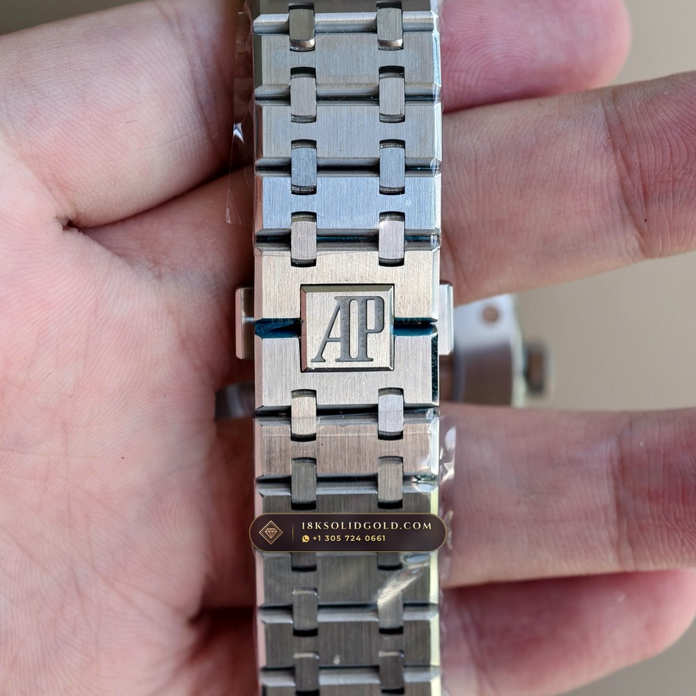 Audemars Piguet Royal Oak Double Balance Wheel Openworked 41mm Baguette Blue Topaz Bezel 18K White Gold Reference 15412BC.TO.1220BC.01 — Hallmarked Edition — Studio Gallery Plate XV in 18K White Gold Au750 (224.8g Verified Mass, Audemars Piguet Cal. 3132 Dual-Balance Openworked)