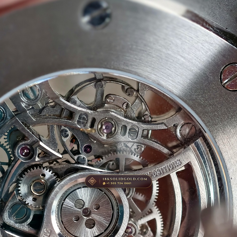 Audemars Piguet Royal Oak Double Balance Wheel Openworked 41mm Baguette Blue Topaz Bezel 18K White Gold Reference 15412BC.TO.1220BC.01 — Hallmarked Edition — Studio Angle 18 in 18K White Gold Au750 (224.8g Verified Mass, Audemars Piguet Cal. 3132 Dual-Balance Openworked)
