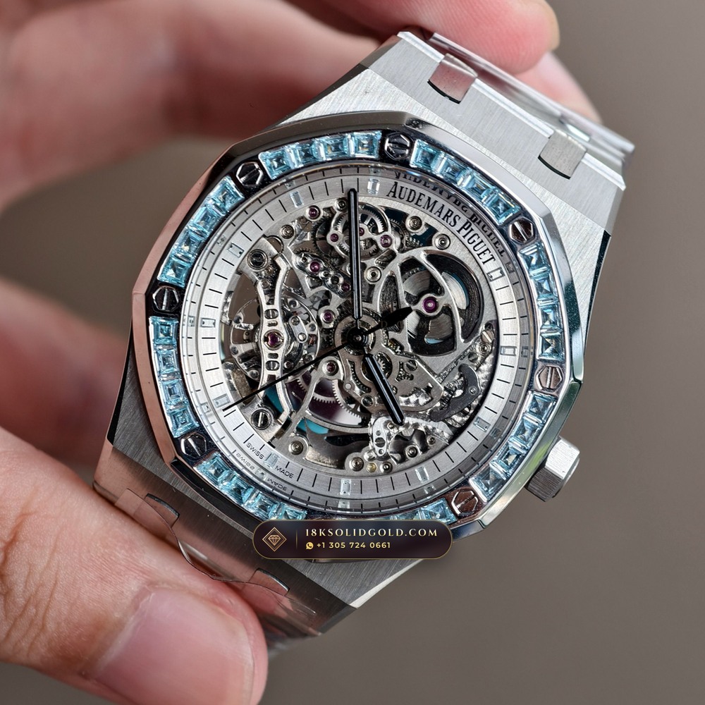 Audemars Piguet Royal Oak Double Balance Wheel Openworked 41mm Baguette Blue Topaz Bezel 18K White Gold Reference 15412BC.TO.1220BC.01 — Hallmarked Edition — Studio Gallery Plate VIII in 18K White Gold Au750 (224.8g Verified Mass, Audemars Piguet Cal. 3132 Dual-Balance Openworked)