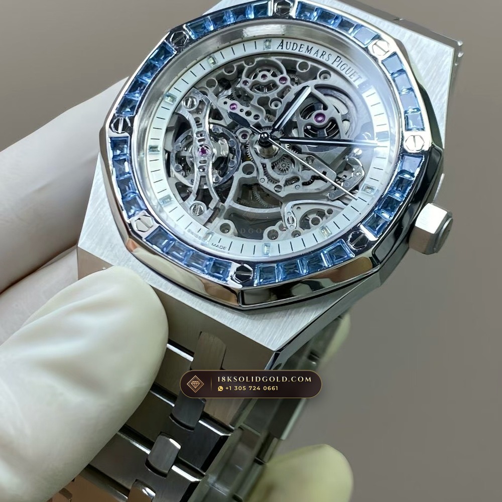 Audemars Piguet Royal Oak Double Balance Wheel Openworked 41mm Baguette Blue Topaz Bezel 18K White Gold Free-Sprung Calibre Reference 15412BC.TO.1220BC.01 — Hallmarked Edition — Studio Gallery Plate VII in 18K White Gold Au750 (224.5g Verified Mass, Audemars Piguet Cal. 3132 Dual-Balance Openworked)