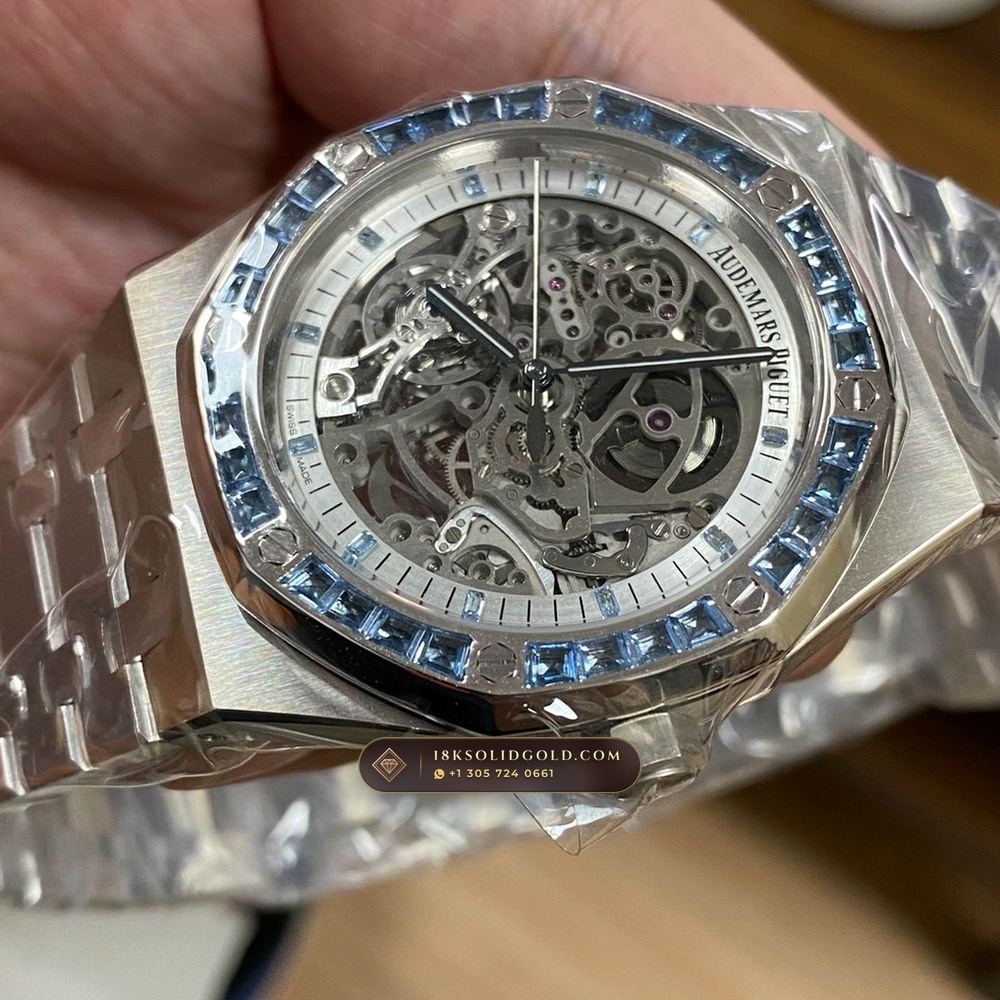 Audemars Piguet Royal Oak Double Balance Wheel Openworked 41mm Baguette Blue Topaz Bezel 18K White Gold Geneva Atelier Spec Reference 15412BC.TO.1220BC.01 — Hallmarked Edition angle 3