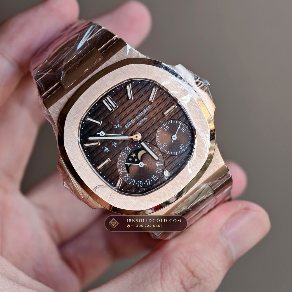 Patek Philippe Nautilus Moonphase & Power Reserve 18K Rose Gold Geneva Atelier Spec Reference 5712/1R-001 — Hallmarked Edition angle 2