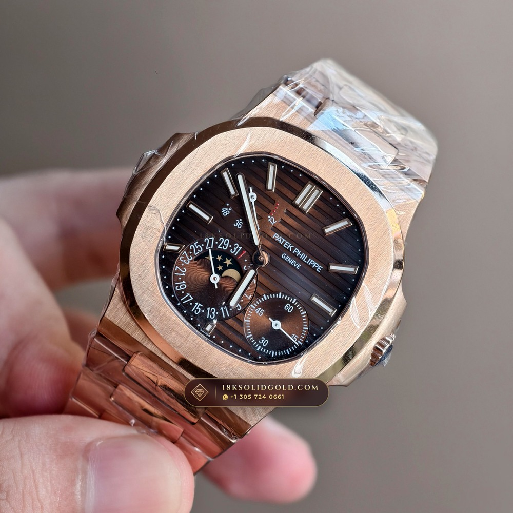 Patek Philippe Nautilus Moonphase & Power Reserve 18K Rose Gold Geneva Atelier Spec Reference 5712/1R-001 — Hallmarked Edition angle 3