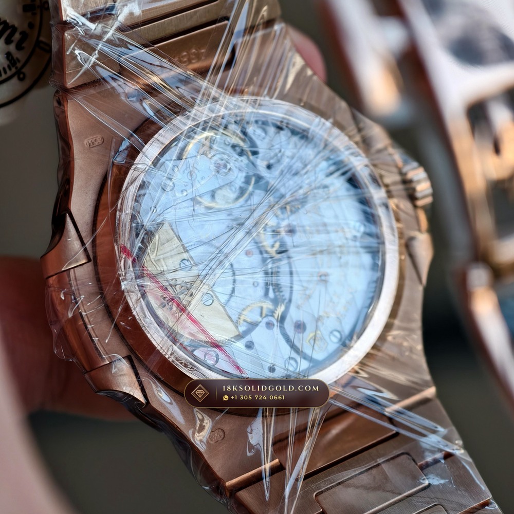 Patek Philippe Nautilus Moonphase & Power Reserve 18K Rose Gold Geneva Atelier Spec Reference 5712/1R-001 — Hallmarked Edition — Studio Gallery Plate VIII in 18K Rose Gold Au750 (186.1g Verified Mass, Patek Philippe Cal. 240 PS IRM C LU - 22K Gold Micro-Rotor)