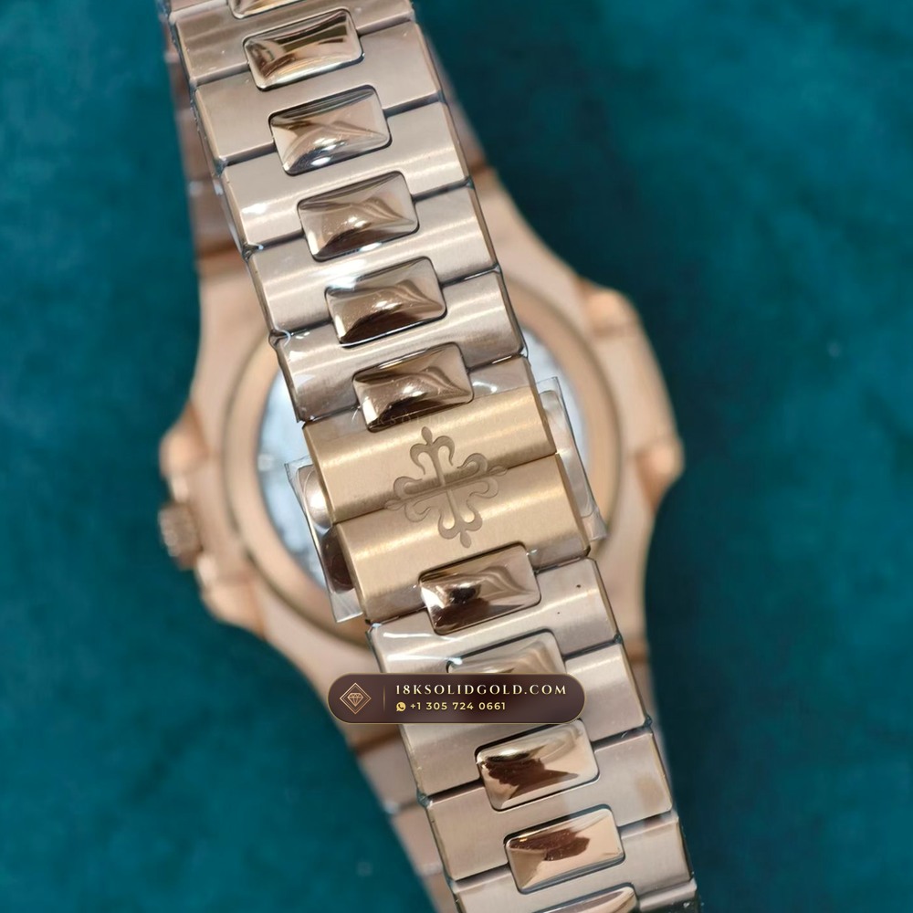 Patek Philippe Nautilus Moonphase & Power Reserve 18K Rose Gold 5-Axis CNC Case Reference 5712/1R-001 — Hallmarked Edition — Studio Gallery Plate VIII in 18K Rose Gold Au750 (186.2g Verified Mass, Patek Philippe Cal. 240 PS IRM C LU - 22K Gold Micro-Rotor)
