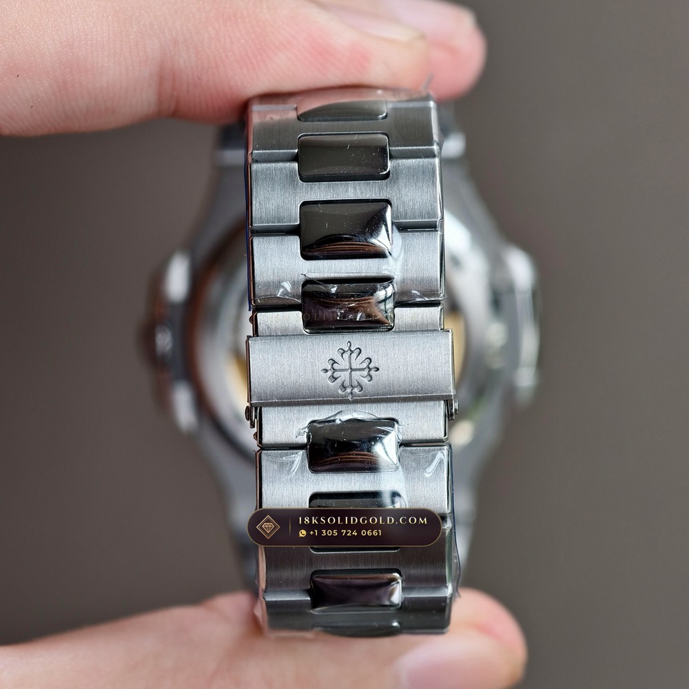 Patek Philippe Nautilus Off-Catalogue Baguette Emerald Bezel 950 Platinum Reference 5711/113P-001 — Hallmarked Edition — Studio Gallery Plate VIII in 950 Platinum Pt950 (245.2g Verified Mass, Patek Philippe Cal. 26-330 S C / Cal. 324 S C - 21K Gold Rotor)