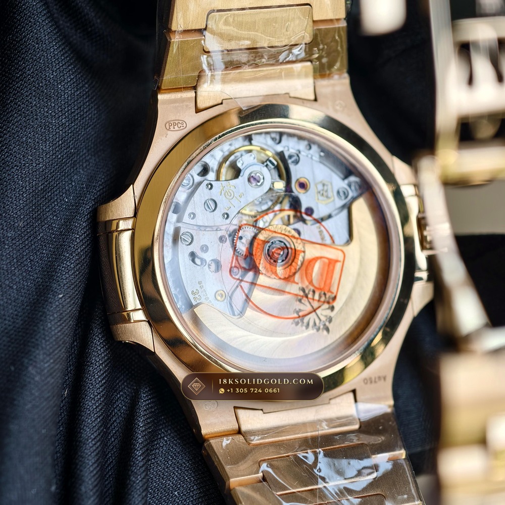 Patek Philippe Nautilus Ladies Automatic 18K Rose Gold Reference 7118/1R-010 — Hallmarked Edition — Studio Gallery Plate VII in 18K Rose Gold Au750 (146.3g Verified Mass, Patek Philippe Cal. 324 S C - 21K Gold Rotor)