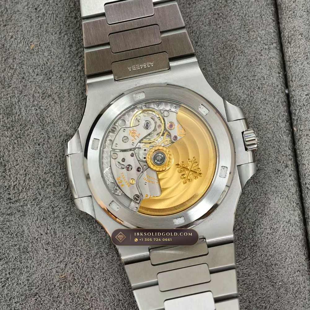 Patek Philippe Nautilus Self-Winding Baguette Ruby Bezel 950 Platinum Reference 5711/112P-001 — Hallmarked Edition — Studio Gallery Plate VII in 950 Platinum Pt950 (245.1g Verified Mass, Patek Philippe Cal. 26-330 S C / Cal. 324 S C - 21K Gold Rotor)