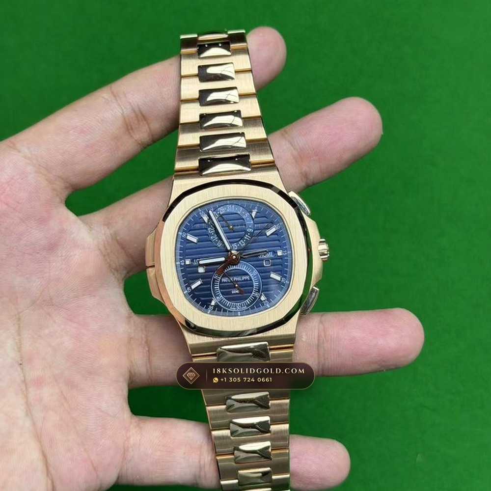 Patek Philippe Nautilus Travel Time Chronograph Sunburst Blue Dial 18K Rose Gold Reference 5990/1R-001 — Hallmarked Edition