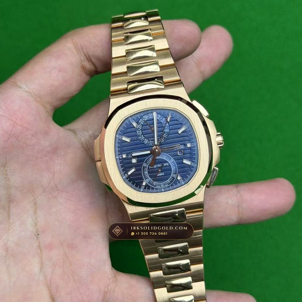 Patek Philippe Nautilus Travel Time Chronograph Sunburst Blue Dial 18K Rose Gold Reference 5990/1R-001 — Hallmarked Edition angle 2