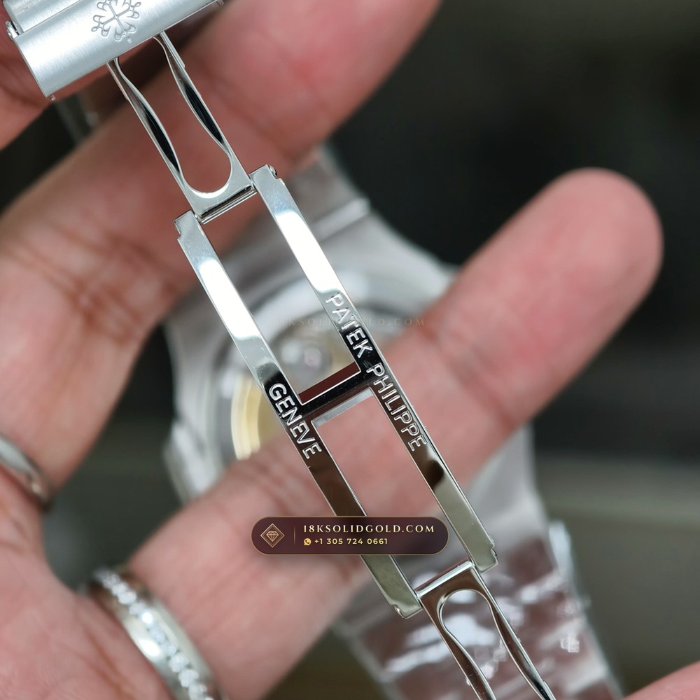 Patek Philippe Nautilus Off-Catalogue Baguette Ruby Bezel 950 Platinum Reference 5711/112P-001 — Hallmarked Edition — Studio Gallery Plate XI in 950 Platinum Pt950 (245.4g Verified Mass, Patek Philippe Cal. 26-330 S C / Cal. 324 S C - 21K Gold Rotor)