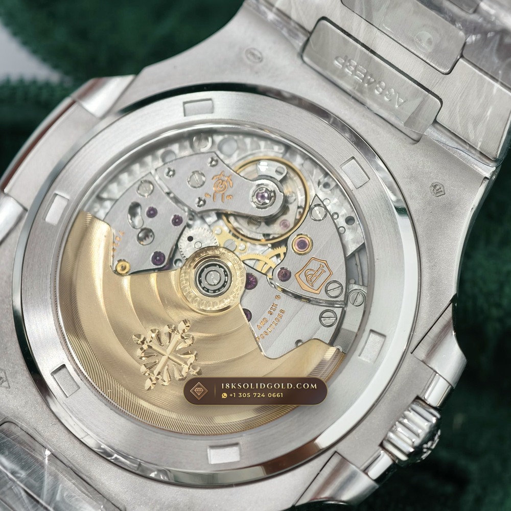 Patek Philippe Nautilus Off-Catalogue Baguette Ruby Bezel 950 Platinum Reference 5711/112P-001 — Hallmarked Edition — Studio Gallery Plate VIII in 950 Platinum Pt950 (245.4g Verified Mass, Patek Philippe Cal. 26-330 S C / Cal. 324 S C - 21K Gold Rotor)