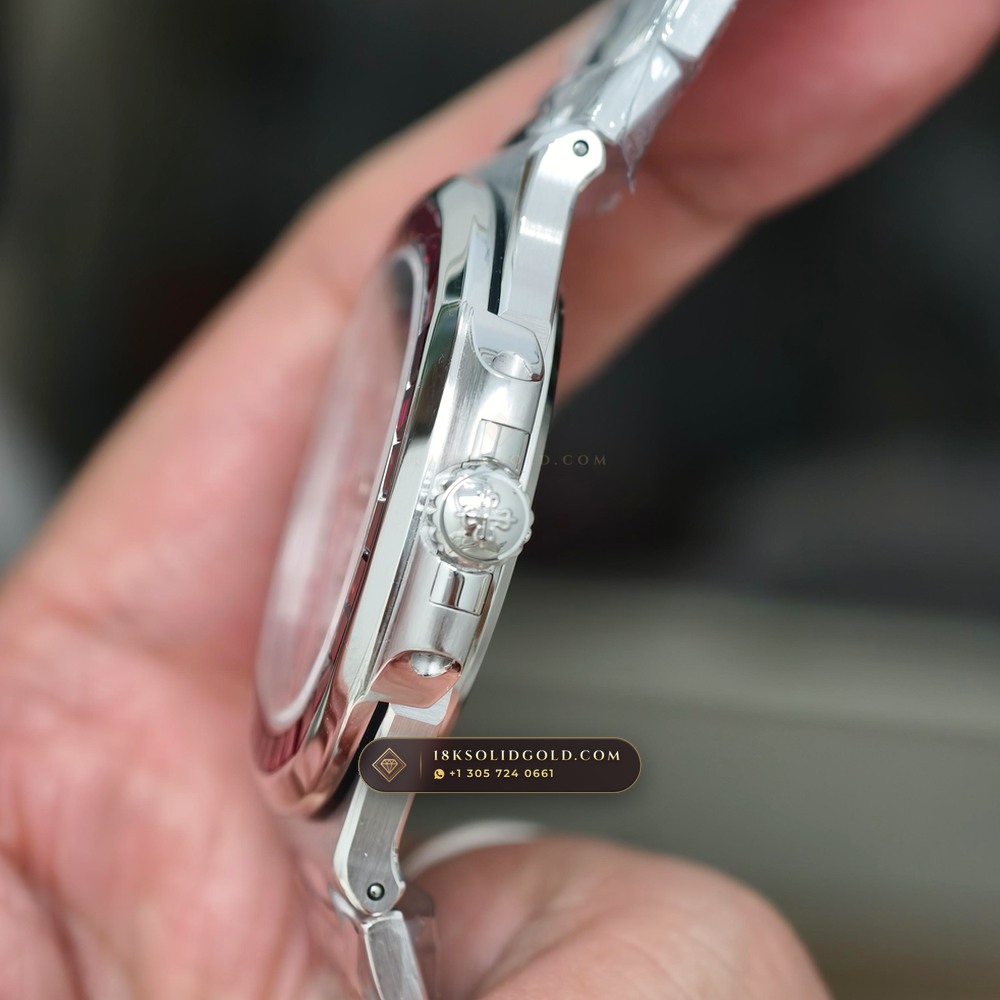 Patek Philippe Nautilus Off-Catalogue Baguette Ruby Bezel 950 Platinum Reference 5711/112P-001 — Hallmarked Edition — Studio Gallery Plate IX in 950 Platinum Pt950 (245.4g Verified Mass, Patek Philippe Cal. 26-330 S C / Cal. 324 S C - 21K Gold Rotor)