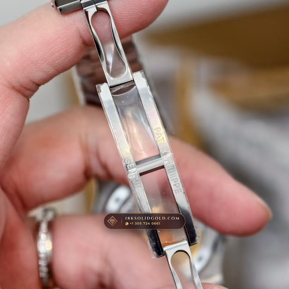 Patek Philippe Nautilus Off-Catalogue Baguette Emerald Bezel 950 Platinum Geneva Atelier Spec Reference 5711/113P-001 — Hallmarked Edition — Studio Gallery Plate VII in 950 Platinum Pt950 (245.0g Verified Mass, Patek Philippe Cal. 26-330 S C / Cal. 324 S C - 21K Gold Rotor)