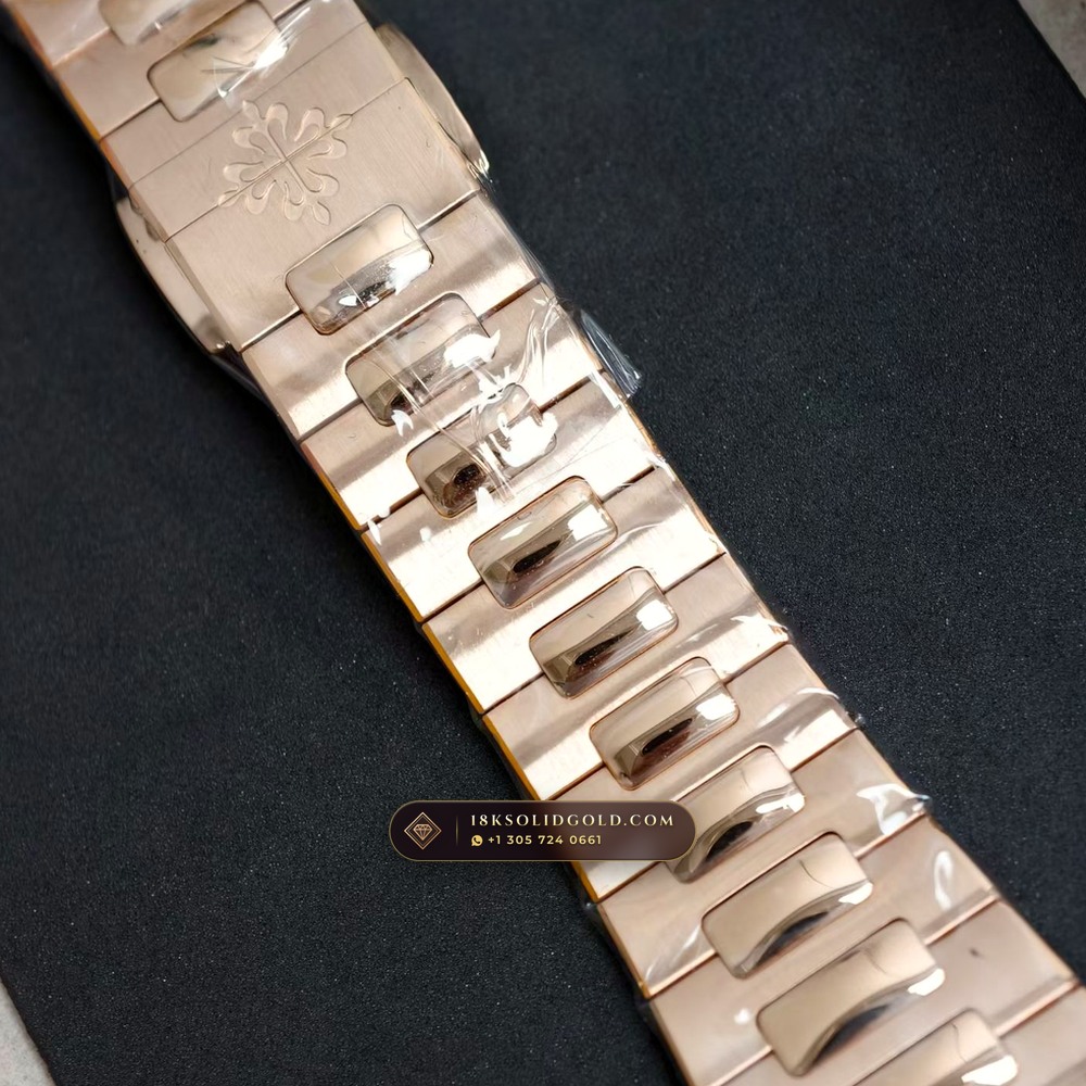Patek Philippe Nautilus Moonphase & Power Reserve Full Solid 18K Rose Gold Bracelet Reference 5712/1R-001 — Hallmarked Edition angle 3