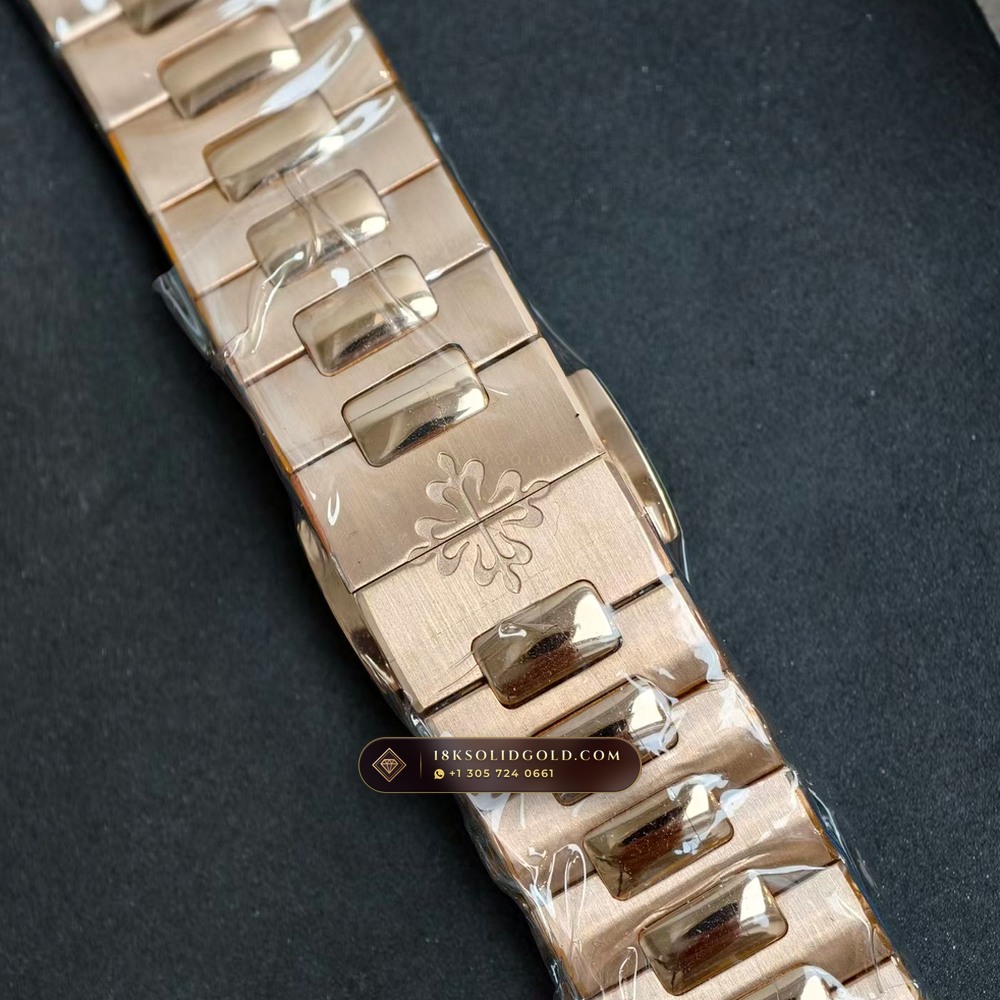 Patek Philippe Nautilus Moonphase & Power Reserve Full Solid 18K Rose Gold Bracelet Reference 5712/1R-001 — Hallmarked Edition — Studio Gallery Plate VII in 18K Rose Gold Au750 (185.2g Verified Mass, Patek Philippe Cal. 240 PS IRM C LU - 22K Gold Micro-Rotor)