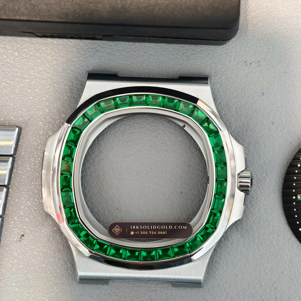 Patek Philippe Nautilus Self-Winding Baguette Emerald Bezel 950 Platinum Geneva Atelier Spec Reference 5711/113P-001 — Hallmarked Edition