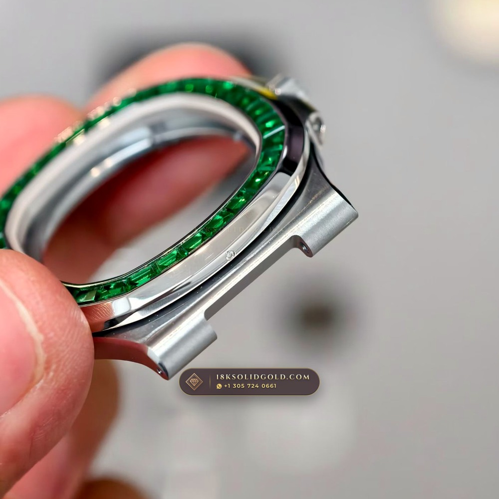 Patek Philippe Nautilus Self-Winding Baguette Emerald Bezel 950 Platinum Geneva Atelier Spec Reference 5711/113P-001 — Hallmarked Edition angle 3