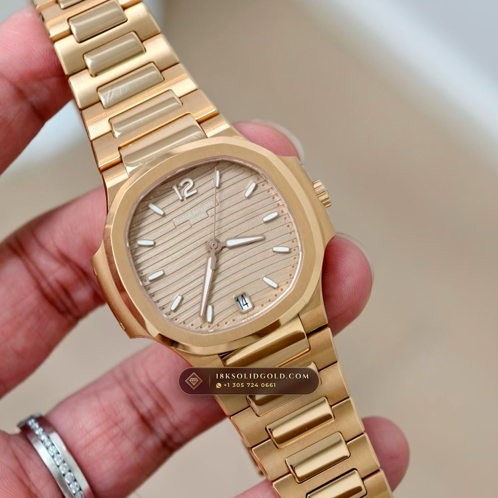Patek Philippe Nautilus Ladies Automatic 18K Rose Gold Reference 7118R — Hallmarked Edition angle 2