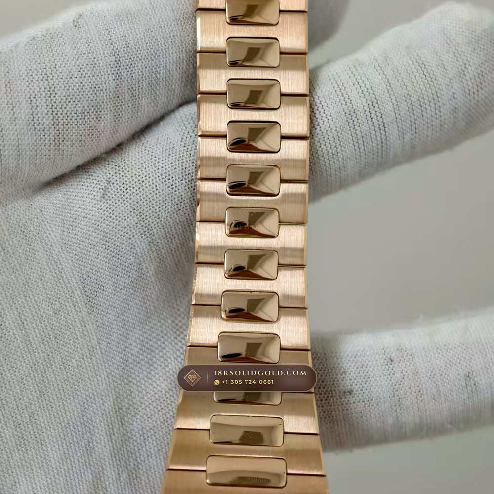 Patek Philippe Nautilus Moonphase & Power Reserve 18K Rose Gold Chronometer Regulated Spec Reference 5712/1R-001 — Hallmarked Edition angle 3