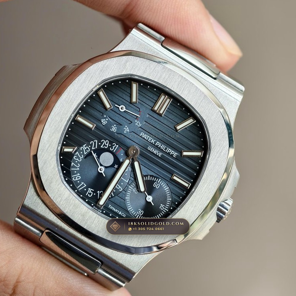Patek Philippe Nautilus Moonphase & Power Reserve Tiffany Blue Dial Reference 5712/1A-001 — Salon Edition angle 3