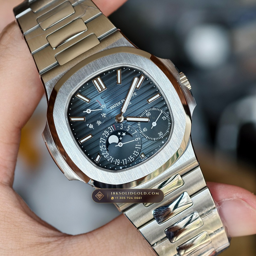 Patek Philippe Nautilus Moonphase & Power Reserve Custom SW Dial 22K Gold Rotor Reference 5712/1A — Salon Edition angle 2