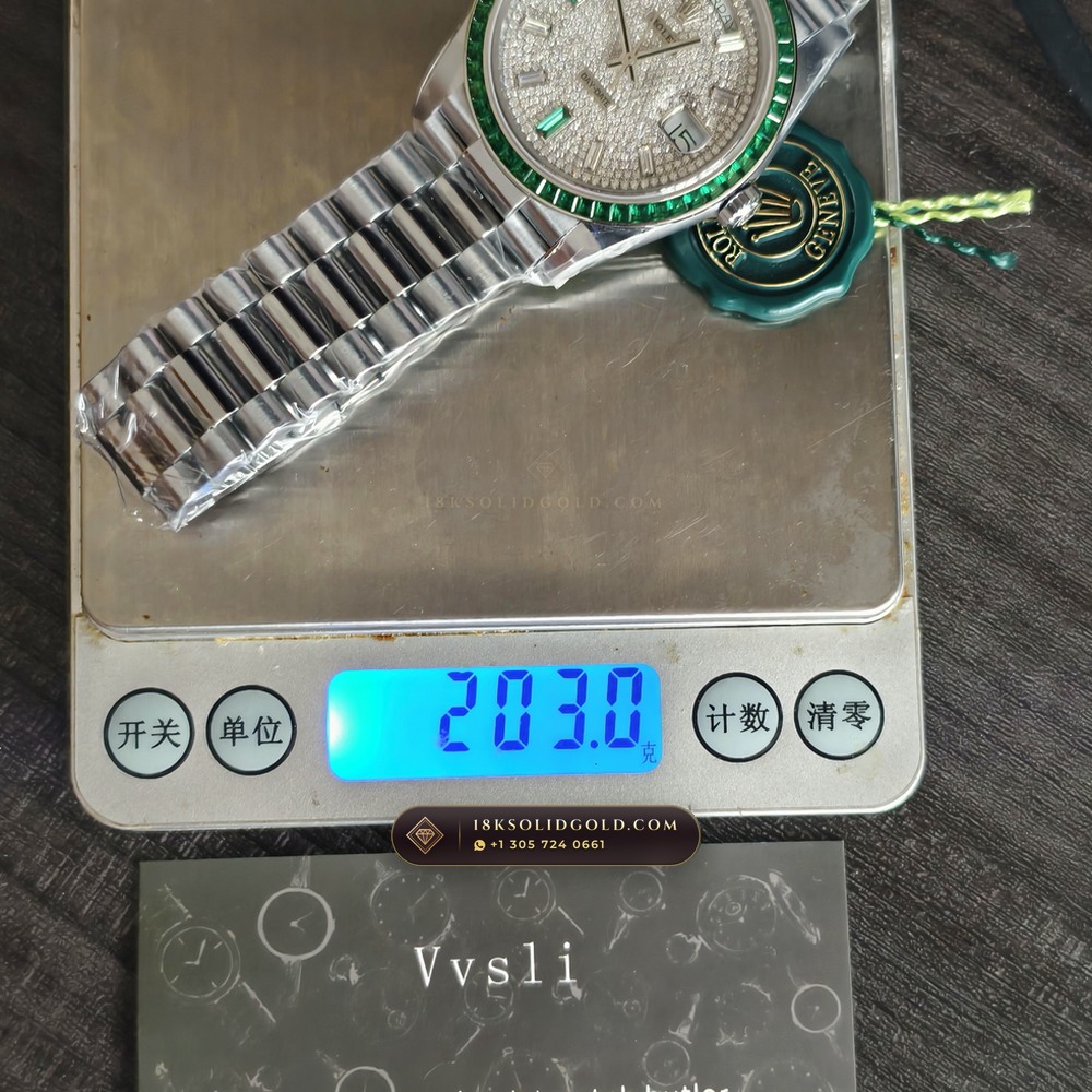 Rolex Day-Date 40 Baguette Emerald Bezel 950 Platinum Reference 228396TEM — Hallmarked Edition — Studio Gallery Plate XI in 950 Platinum Pt950 (280.7g Verified Mass, Rolex Manufacture Cal. 3255 - 70h Power Reserve)