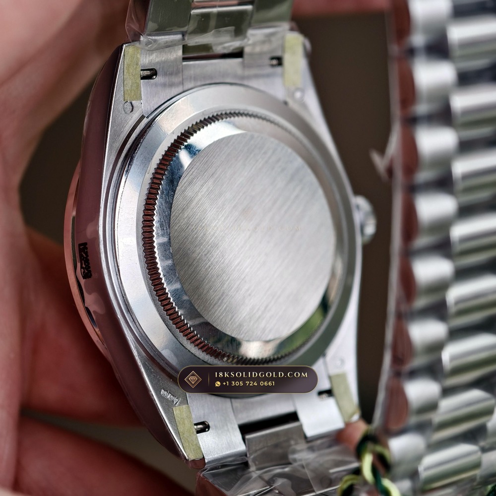 Rolex Day-Date 40 Baguette Emerald Bezel 950 Platinum Reference 228396TEM — Hallmarked Edition — Studio Gallery Plate IX in 950 Platinum Pt950 (280.7g Verified Mass, Rolex Manufacture Cal. 3255 - 70h Power Reserve)