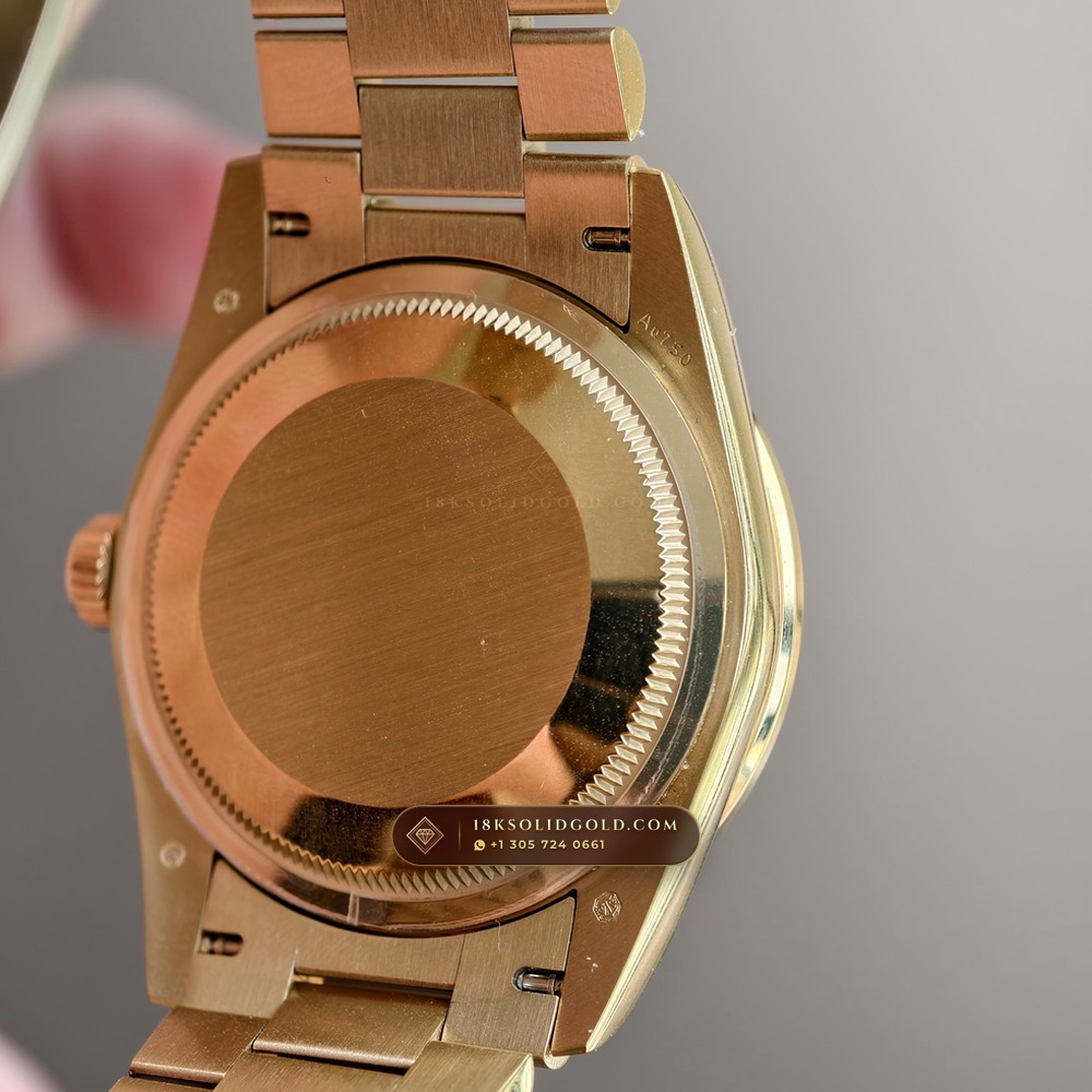 Rolex Day-Date 36 Mother-of-Pearl & Diamond Bezel 18K Yellow Gold Reference 128348RBR — Hallmarked Edition — Studio Gallery Plate VII in 18K Yellow Gold Au750 (183.2g Verified Mass, Rolex Manufacture Cal. 3255 - 70h Power Reserve)