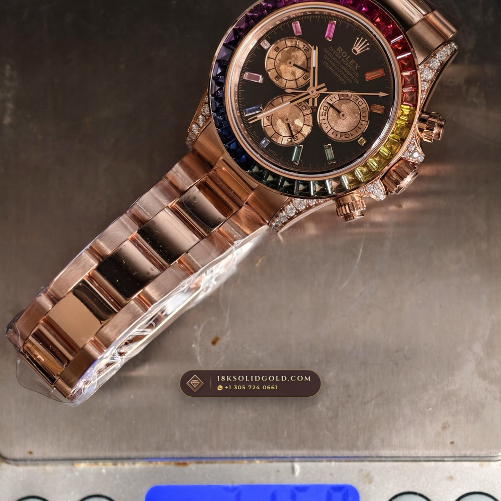 Rolex Cosmograph Daytona Rainbow Sapphire Bezel 18K Everose Gold Reference 116595RBOW — Hallmarked Edition — Studio Gallery Plate IX in 18K Rose Gold Au750 (216.9g Verified Mass, Rolex Manufacture Cal. 4130 - 72h Power Reserve)